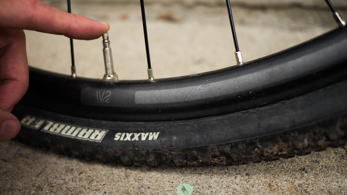 Letting the air out of a tire.