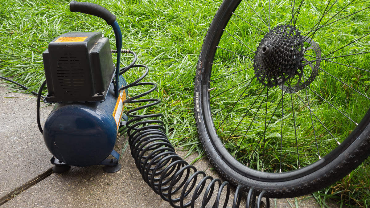 Air compressor and assembled tire photo.