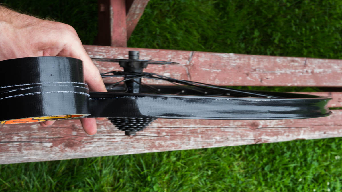 Using Gorilla Tape to seal the spoke holes.