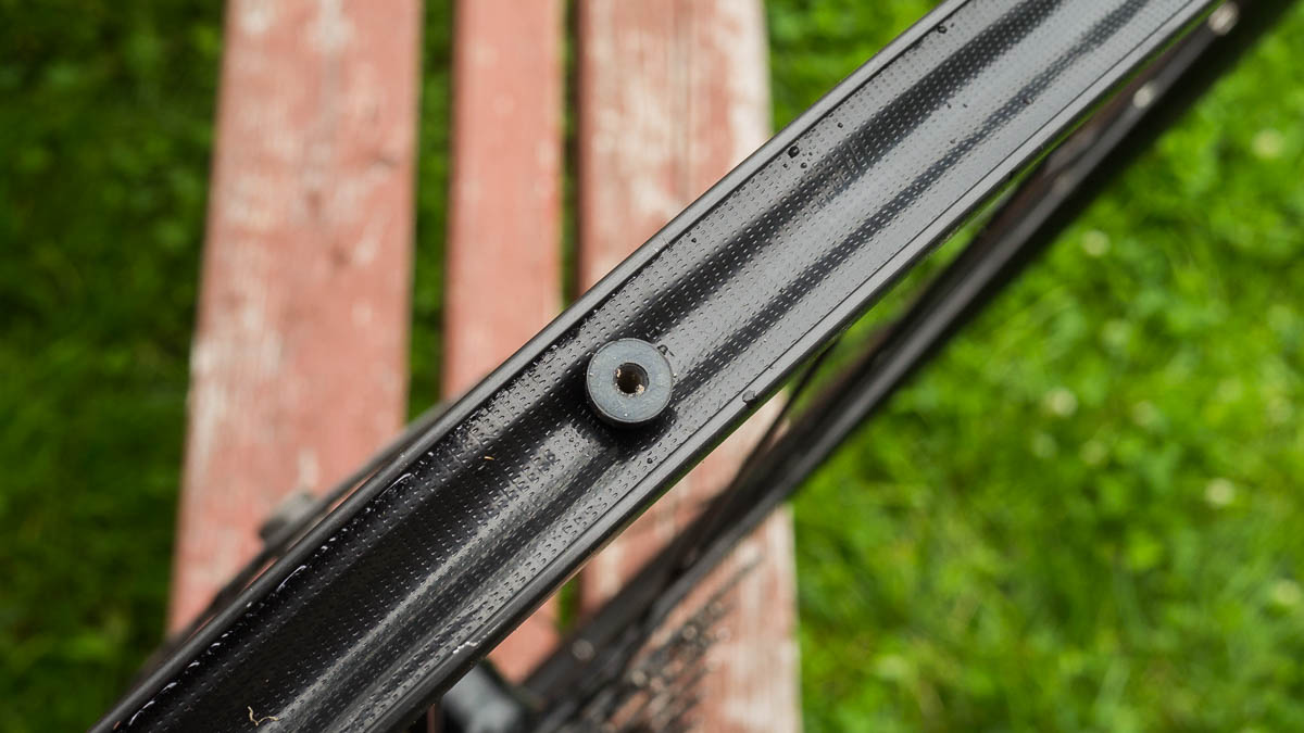 The new valve stem installed in the rim.